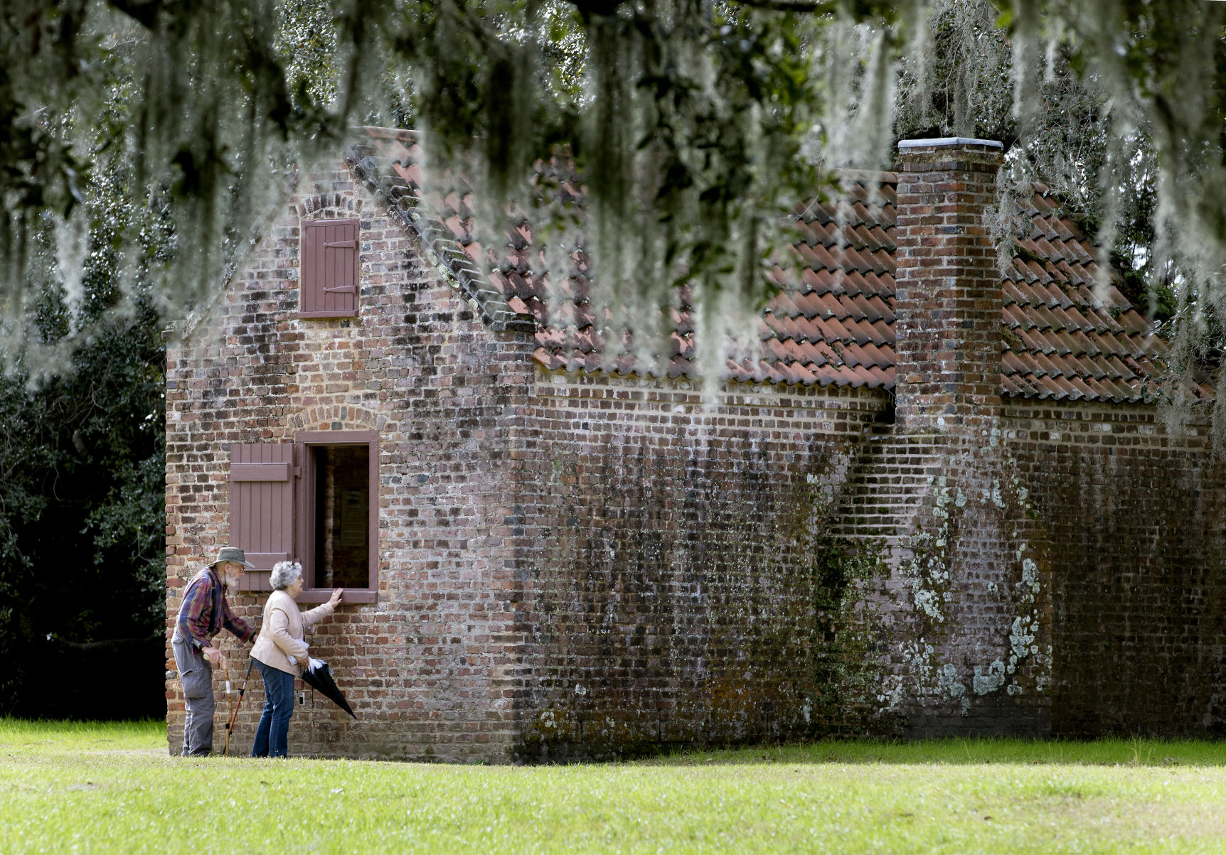 Slave cabin visitors.jpg